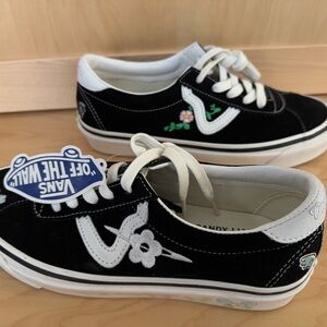 Vans Black and White Sneakers with Classic Skate Design
